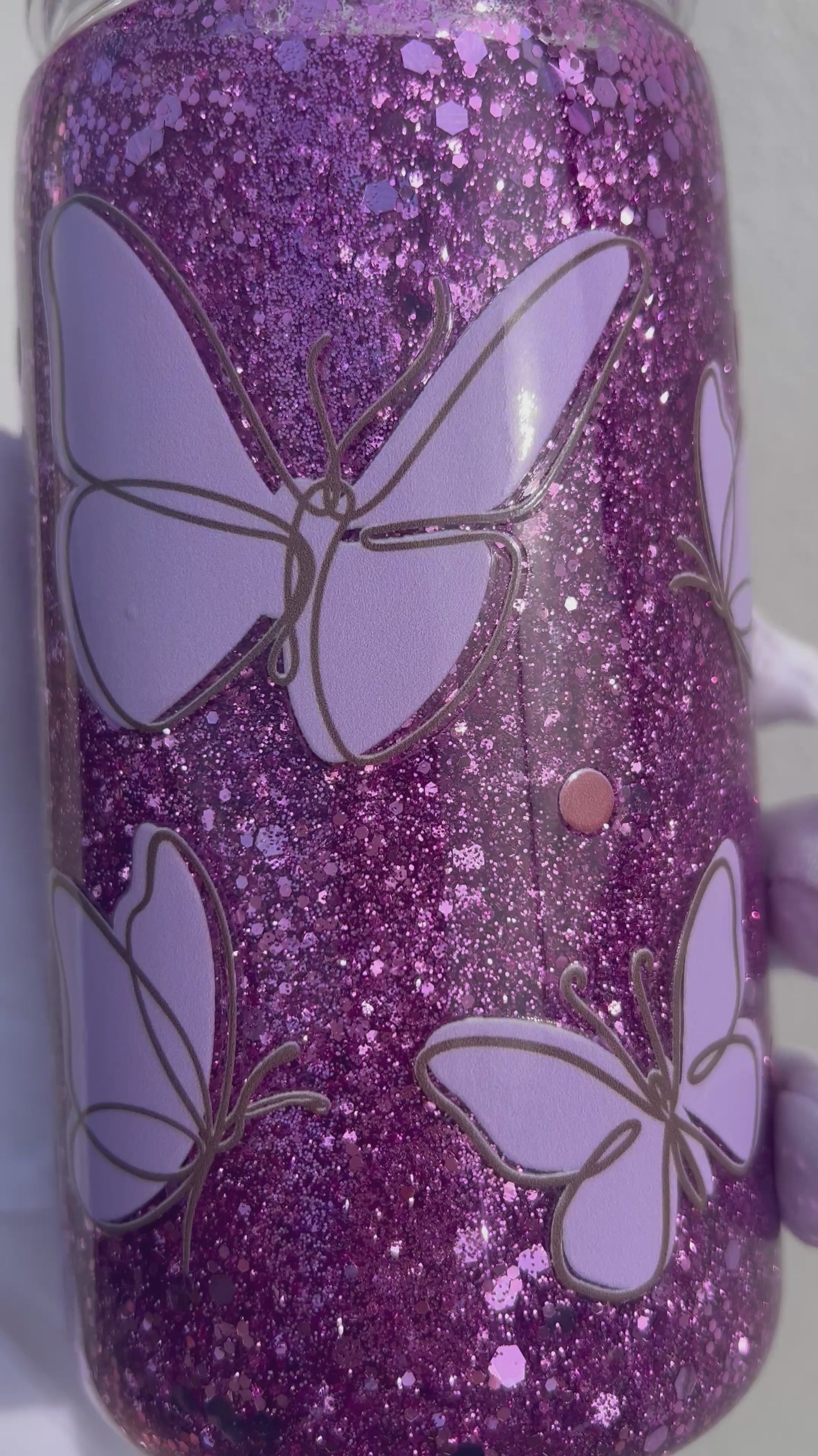 Video snowglobe tumbler Butterfly Lilac in movimento, glitter farfalle viola