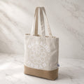 Tote bag cotone naturale e yute con stampa Be a Kind Human margherita sorridente